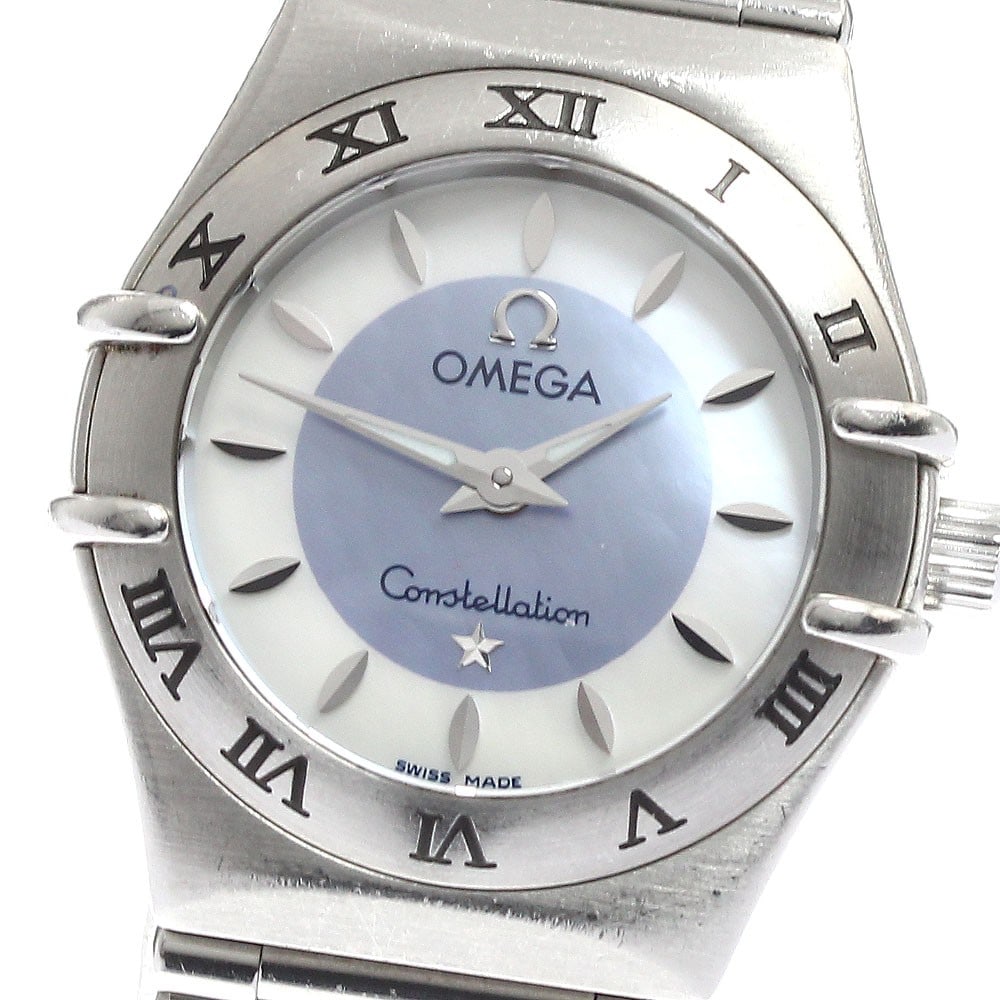Omega Constellation 1562.84 Ladies Quartz Wristwatch: Omega Constellation 1562.84 Ladies Quartz Wristwatch This OMEGA Constellation Quartz ladies wristwatch features a stainless steel case and bracelet, paired with a distinctive white and blue shell dial