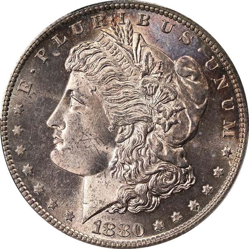 PCGS MS65 1880-S Morgan Dollar Toned Silver: PCGS MS65 1880-S Morgan Dollar Toned Silver This is an 1880-S Morgan Silver Dollar graded MS65 by PCGS. The coin is uncirculated and features attractive toning. It is composed of silver with a finenes