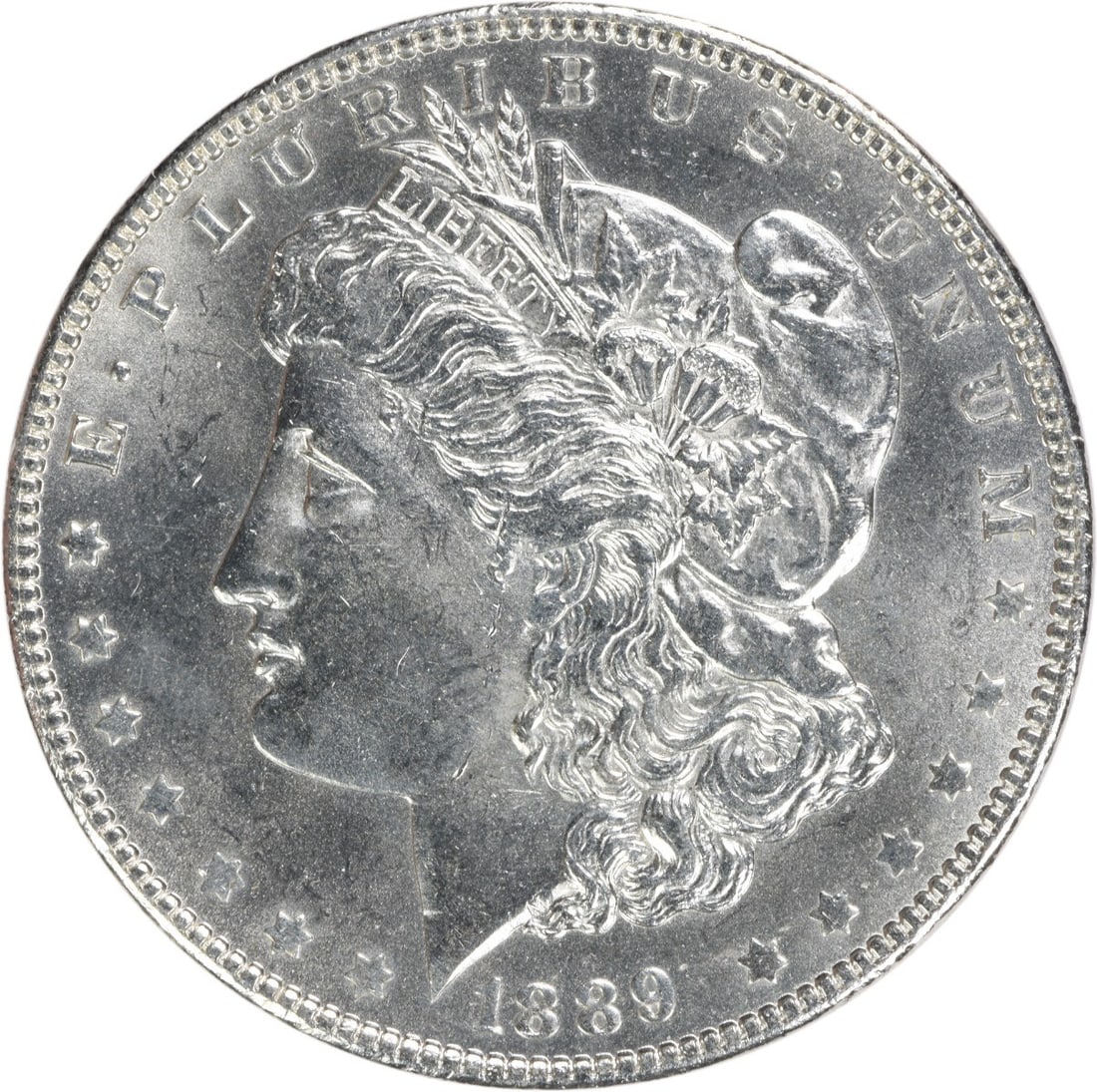 Brilliant Uncirculated 1889 Silver Morgan Dollar Philadelphia Uncertified: Brilliant Uncirculated 1889 Silver Morgan Dollar Philadelphia Uncertified This 1889 Morgan Silver Dollar is an uncirculated coin in Brilliant Uncirculated (BU) condition. It is uncertified and compose