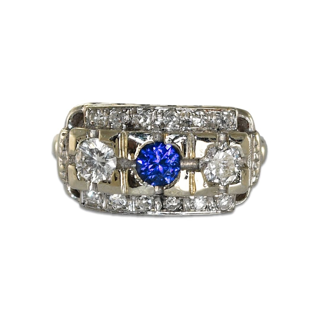 Art Deco Sapphire Diamond Ring 14K White Gold Size 5.75: Art Deco Sapphire Diamond Ring 14K White Gold Size 5.75 This Art Deco style ring features a vibrant blue sapphire as the centerpiece, accented by sparkling diamonds. Crafted in 14K white gold, the thr