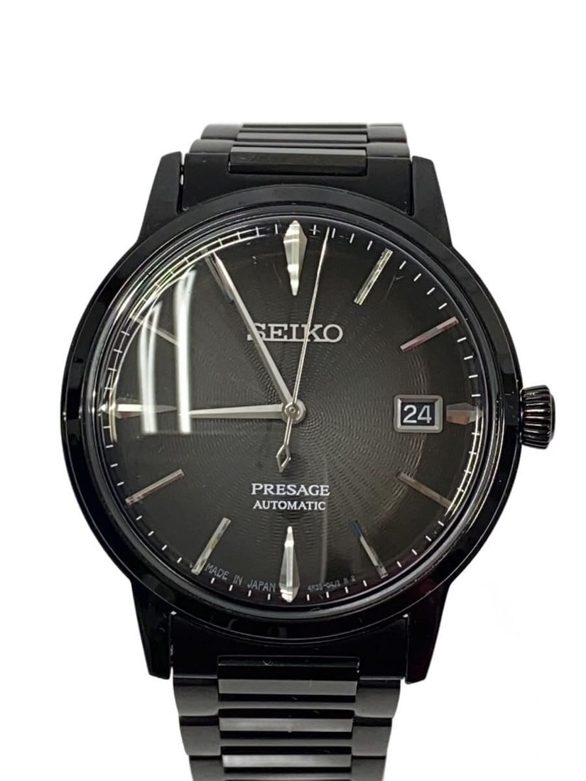 Seiko Presage Cocktail Time Black Stainless Steel Wristwatch: Seiko Presage Cocktail Time Black Stainless Steel Wristwatch This SEIKO Presage Cocktail Time 4R35-05E0 men's wristwatch features a black dial and stainless steel construction. Made in Japan, the watc