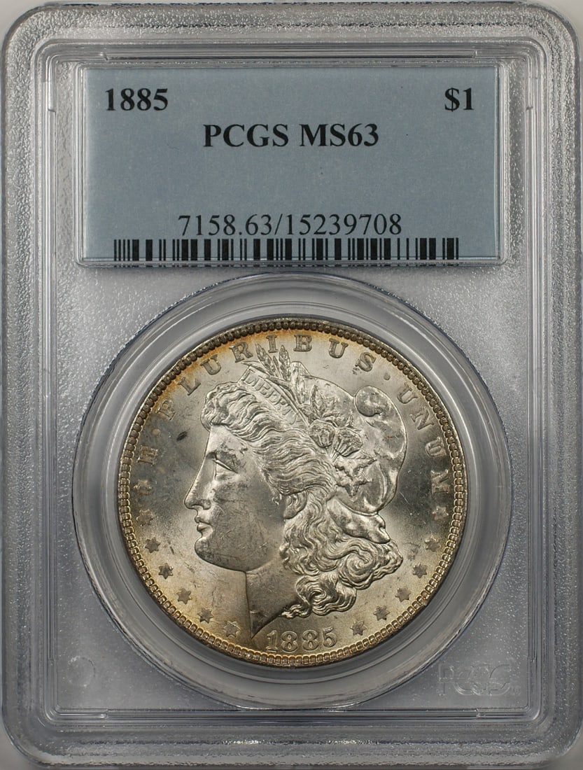 PCGS MS 63 Graded 1885 Morgan Dollar Uncirculated Silver Coin: PCGS MS 63 Graded 1885 Morgan Dollar Uncirculated Silver Coin This is an 1885 Morgan Silver Dollar coin, certified by PCGS with a grade of MS 63. The coin is uncirculated and was minted in Philadelphi
