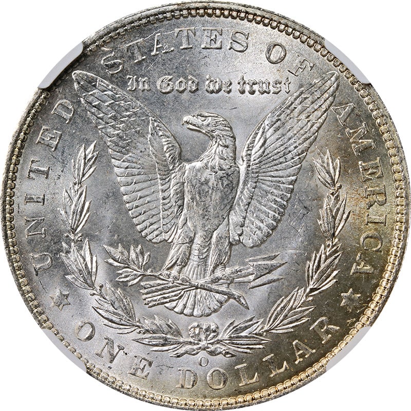 NGC MS63 1904 O Silver Morgan Dollar with Lightly Toned Reverse: NGC MS63 1904 O Silver Morgan Dollar with Lightly Toned Reverse This 1904-O Morgan Silver Dollar is graded MS63 by NGC and features a white obverse with light toning on the reverse. Struck at the New 