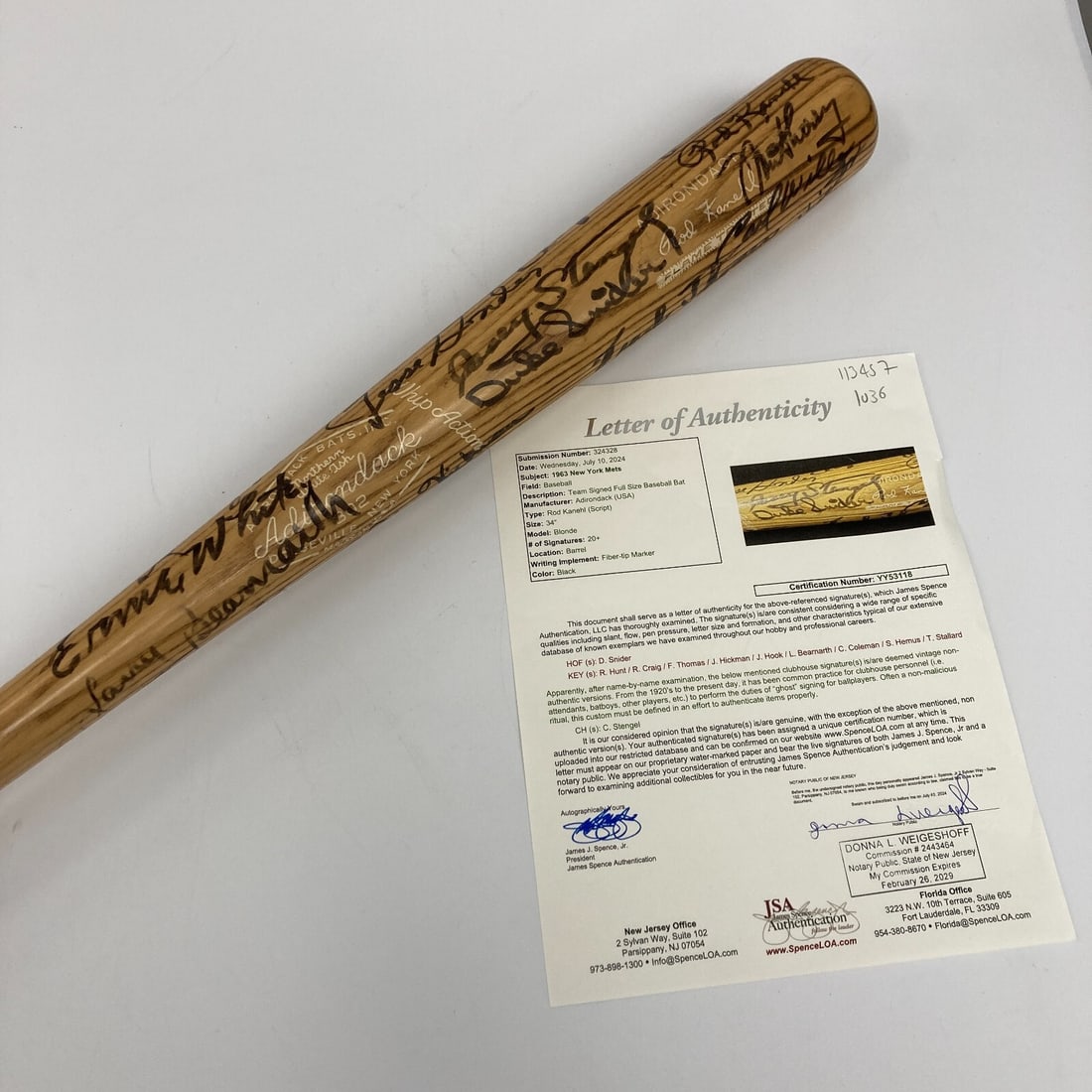 1963 New York Mets Game Issued Bat 20+ Signatures JSA COA: 1963 New York Mets Game Issued Bat 20+ Signatures JSA COA This is a vintage 1963 New York Mets team signed baseball bat featuring over 20 signatures from the team members, including Rod Kanehl. It is 