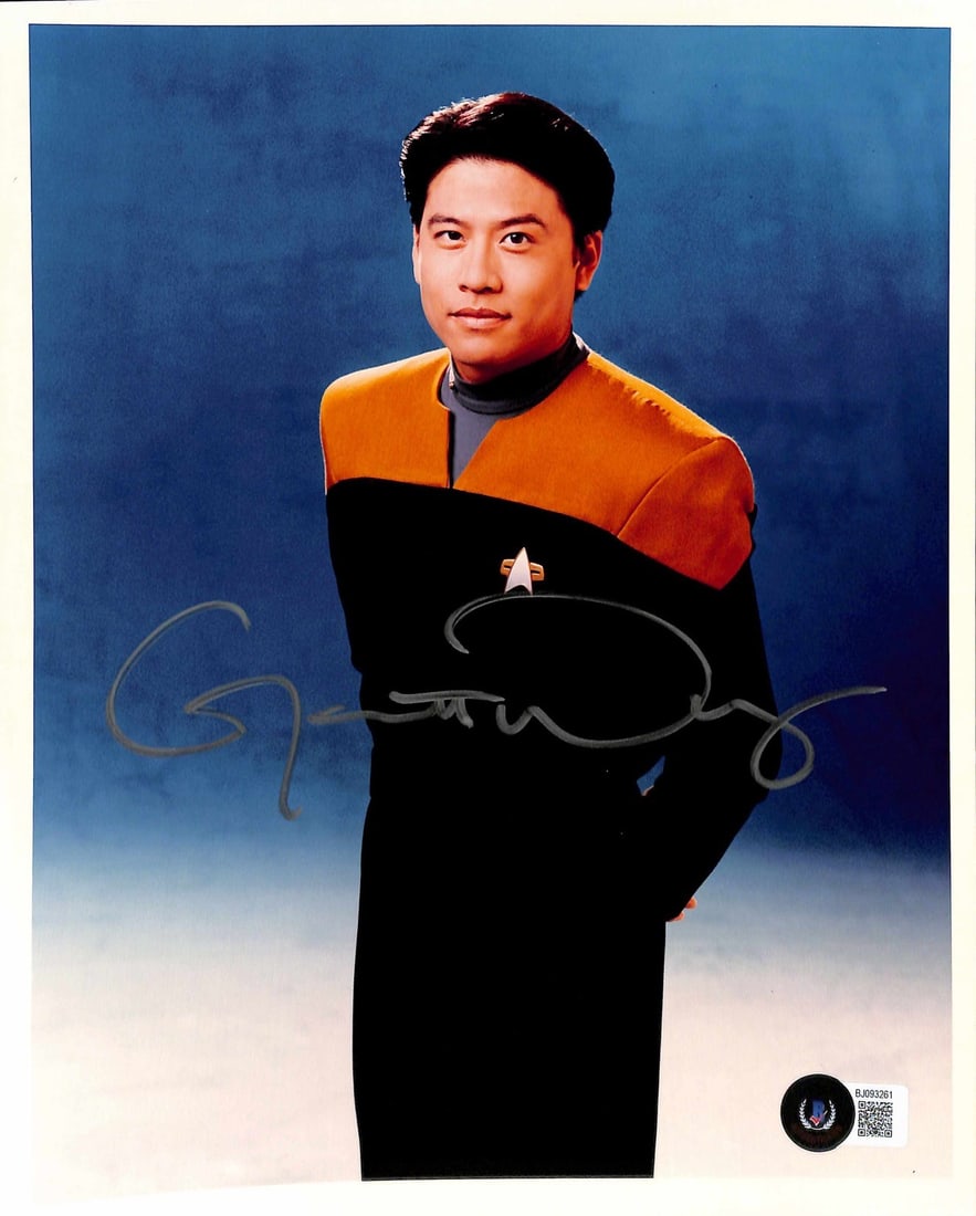 Garrett Wang Signed 8x10 Harry Kim Photo Beckett Certified: Garrett Wang Signed 8x10 Harry Kim Photo Beckett Certified This is an original 8x10 color photograph signed by Garrett Wang as Ensign Harry Kim from Star Trek: Voyager. The autograph is authenticated 