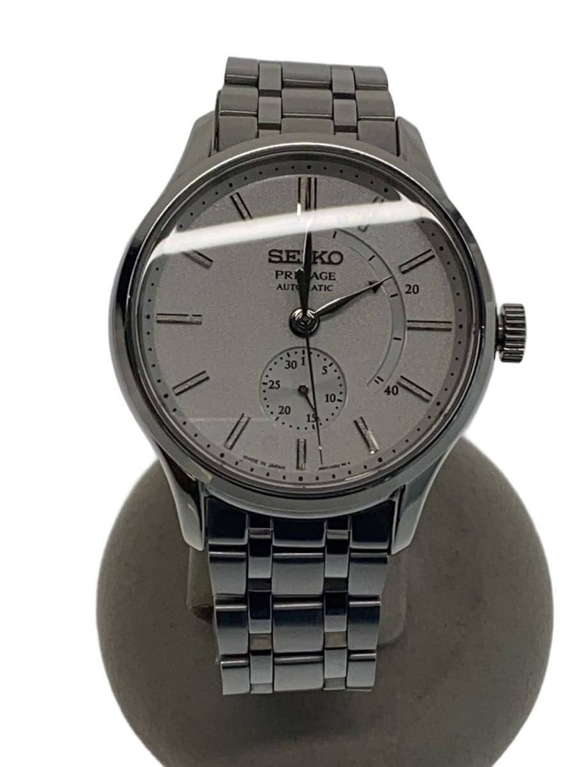 Seiko Presage stainless steel men's wristwatch 4R57-00N0: Seiko Presage stainless steel men's wristwatch 4R57-00N0 This SEIKO Presage 4R57-00N0 men's wristwatch features a classic white dial and a durable stainless steel case. Made in Japan, the watch is pre