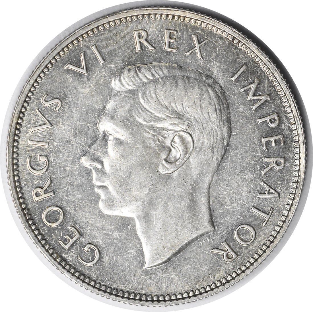 South Africa 1947 Proof 2 1 2 Shillings KM30: South Africa 1947 Proof 2 1 2 Shillings KM30 This 1947 South Africa 2 1/2 Shillings coin is a proof grade example from South Africa. It is circulated and comes uncertified. The coin features a profile