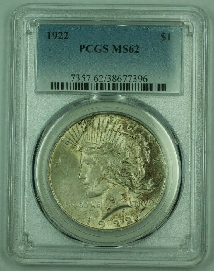 PCGS MS-62 1922 Peace Dollar Silver Coin Toned Uncirculated: PCGS MS-62 1922 Peace Dollar Silver Coin Toned Uncirculated This 1922 Peace Silver Dollar features a $1 denomination and is composed of 90% silver. Certified by PCGS with a grade of MS-62, this uncirc