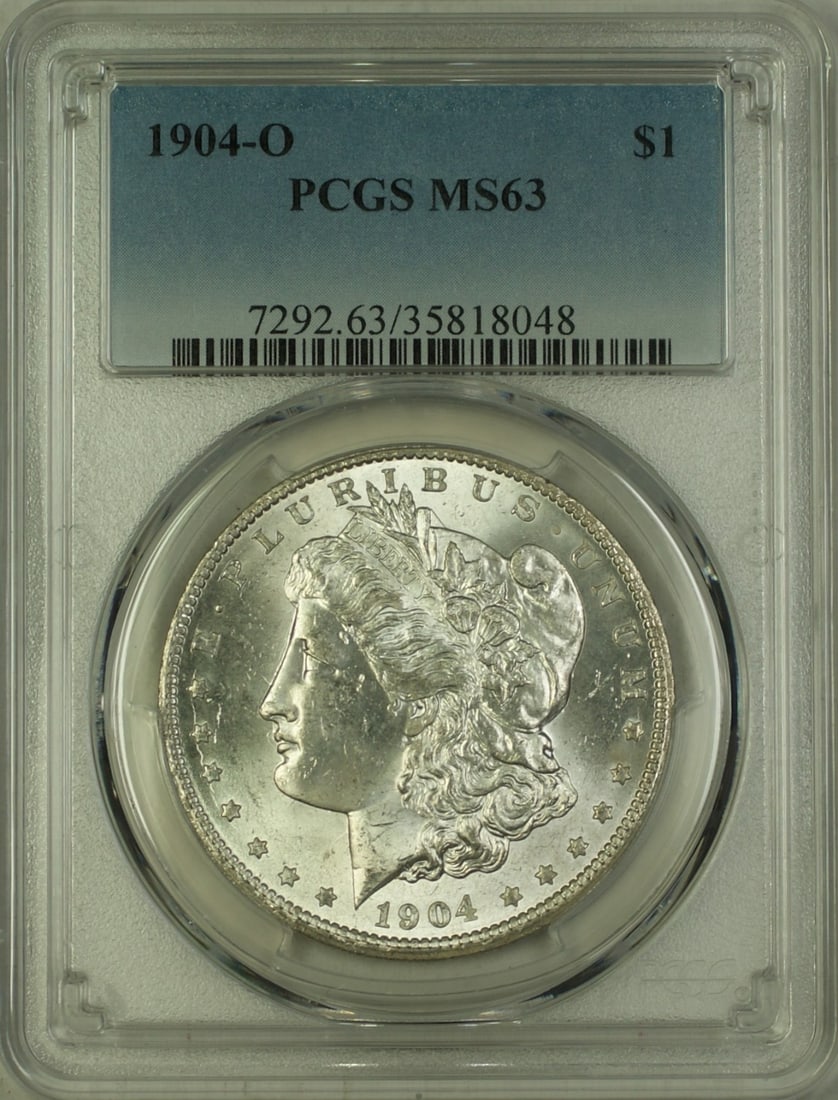 PCGS MS-63 1904-O Morgan Dollar Silver Coin from New Orleans Mint: PCGS MS-63 1904-O Morgan Dollar Silver Coin from New Orleans Mint This 1904-O Morgan Silver Dollar is a $1 coin minted in New Orleans. It is certified by PCGS with a grade of MS 63, indicating uncircu