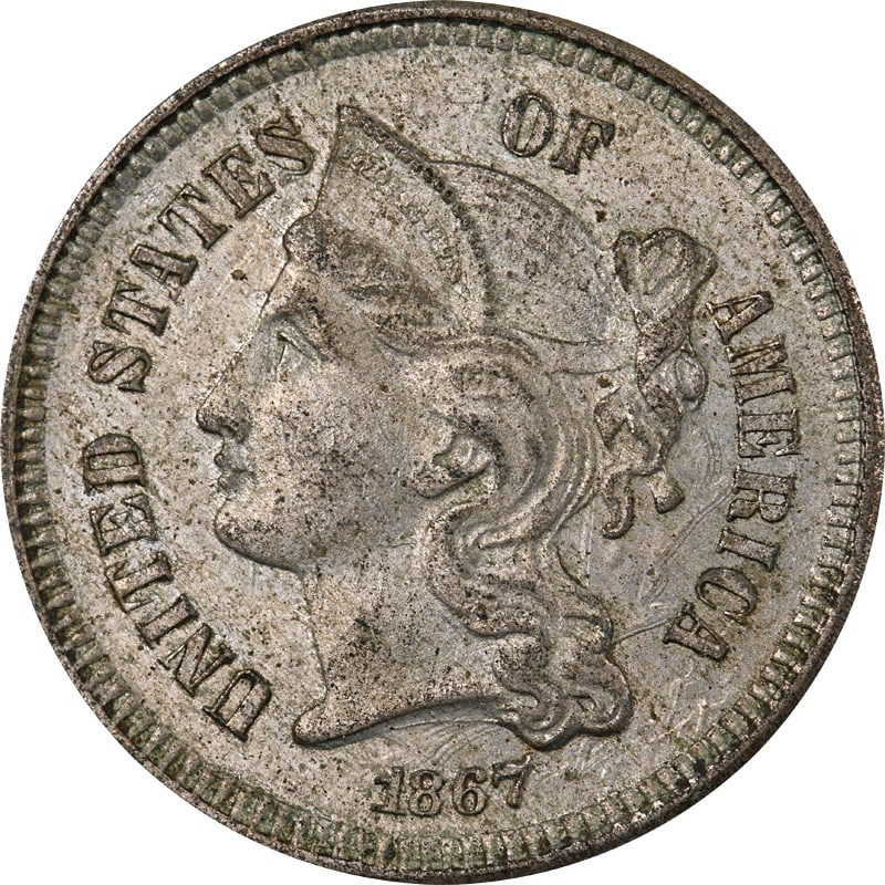 Circulated 1867 United States Nickel Three Cent Piece Uncertified: Circulated 1867 United States Nickel Three Cent Piece Uncertified This is an 1867 Three Cent Nickel coin from the United States. The coin is circulated and composed of nickel. It is pre-owned and unce