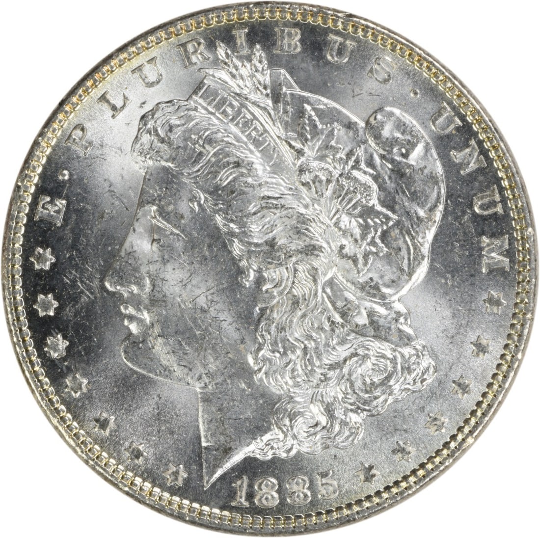 Uncirculated 1885 Silver Morgan Dollar Brilliant Uncertified Philadelphia Mint: Uncirculated 1885 Silver Morgan Dollar Brilliant Uncertified Philadelphia Mint This is an uncirculated 1885 Morgan Silver Dollar from the United States. The coin features a brilliant uncirculated (BU)