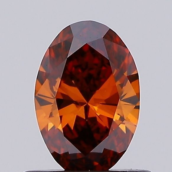 Loose Diamond - OVAL 0.52ct Fancy Deep Orange VS1: Loose Diamond - OVAL 0.52ct Fancy Deep Orange VS1 Source: This is a real non-mined Diamond that has been grown in a lab Shape: OVAL Carats: 0.52 Color: Fancy Deep Orange Certification: IGI Video: