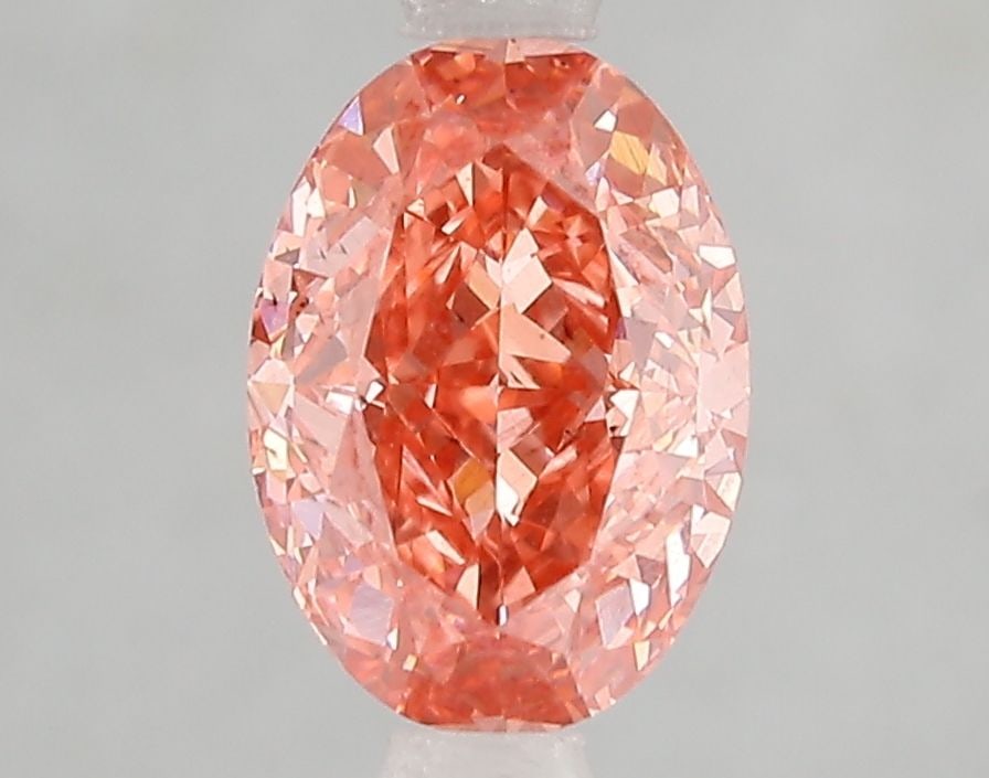 Loose Diamond - OVAL 2.1ct Fancy Vivid Pink SI1: Loose Diamond - OVAL 2.1ct Fancy Vivid Pink SI1 Source: This is a real non-mined Diamond that has been grown in a lab Shape: OVAL Carats: 2.1 Color: Fancy Vivid Pink Certification: IGI Video:
