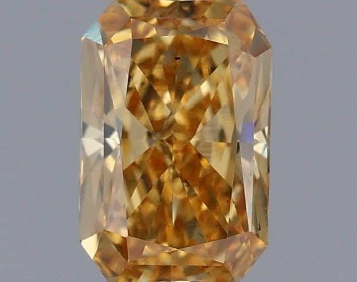Loose Diamond - RADIANT 0.42ct Fancy Intense Brownish Yellow VS2: Loose Diamond - RADIANT 0.42ct Fancy Intense Brownish Yellow VS2 Source: This is a real non-mined Diamond that has been grown in a lab Shape: RADIANT Carats: 0.42 Color: Fancy Intense Brownish Yellow 