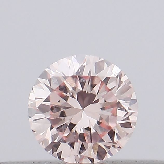 Loose Diamond - ROUND 0.12ct Fancy Light Pink VS1: Loose Diamond - ROUND 0.12ct Fancy Light Pink VS1 Source: This is a real non-mined Diamond that has been grown in a lab Shape: ROUND Carats: 0.12 Color: Fancy Light Pink Certification: IGI Video:
