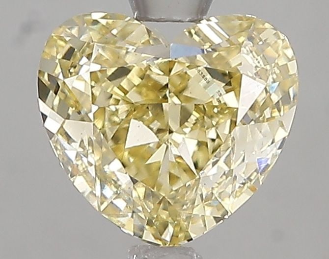 Loose Diamond - HEART 1.82ct Fancy Intense Yellow VS1: Loose Diamond - HEART 1.82ct Fancy Intense Yellow VS1 Source: This is a real non-mined Diamond that has been grown in a lab Shape: HEART Carats: 1.82 Color: Fancy Intense Yellow Certification: IGI Vid