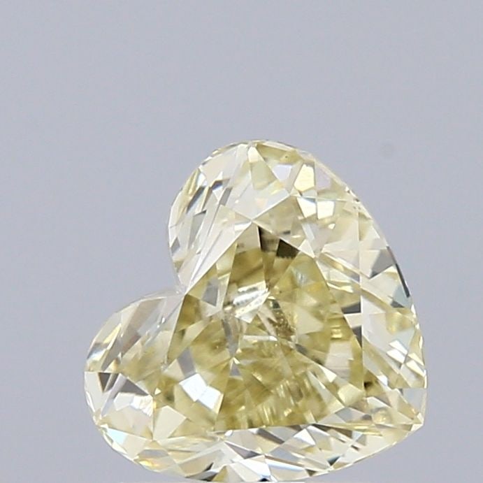 Loose Diamond - HEART 0.98ct Fancy Light Yellow VS1: Loose Diamond - HEART 0.98ct Fancy Light Yellow VS1 Source: This is a real non-mined Diamond that has been grown in a lab Shape: HEART Carats: 0.98 Color: Fancy Light Yellow Certification: IGI Video: