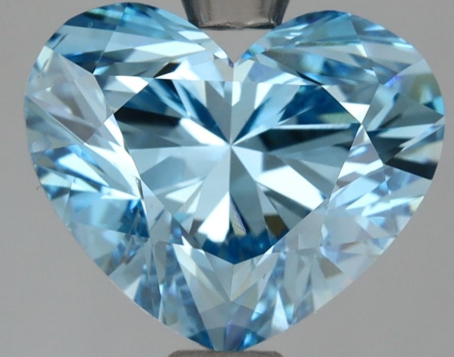 Loose Diamond - HEART 3.01ct Fancy Vivid Blue SI1: Loose Diamond - HEART 3.01ct Fancy Vivid Blue SI1 Source: This is a real non-mined Diamond that has been grown in a lab Shape: HEART Carats: 3.01 Color: Fancy Vivid Blue Certification: IGI Video: