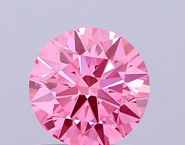 Ideal Loose Diamond - ROUND 1.05ct Fancy Vivid Pink VVS2: Ideal Loose Diamond - ROUND 1.05ct Fancy Vivid Pink VVS2 Source: This is a real non-mined Diamond that has been grown in a lab Shape: ROUND Carats: 1.05 Color: Fancy Vivid Pink Certification: IGI Vide