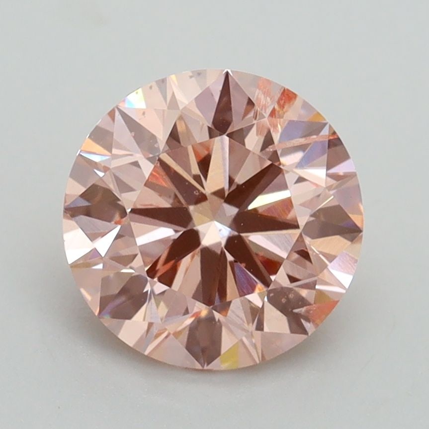 Loose Diamond - ROUND 2.0ct Fancy Intense Pink SI2: Loose Diamond - ROUND 2.0ct Fancy Intense Pink SI2 Source: This is a real non-mined Diamond that has been grown in a lab Shape: ROUND Carats: 2.0 Color: Fancy Intense Pink Certification: IGI Video:
