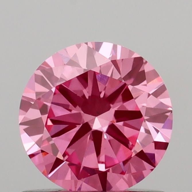 Loose Diamond - ROUND 0.74ct Fancy Vivid Pink VVS2: Loose Diamond - ROUND 0.74ct Fancy Vivid Pink VVS2 Source: This is a real non-mined Diamond that has been grown in a lab Shape: ROUND Carats: 0.74 Color: Fancy Vivid Pink Certification: IGI Video: