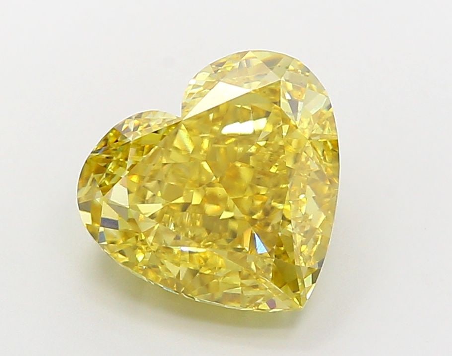 Loose Diamond - HEART 5.72ct Fancy Vivid Yellow VS2: Loose Diamond - HEART 5.72ct Fancy Vivid Yellow VS2 Source: This is a real non-mined Diamond that has been grown in a lab Shape: HEART Carats: 5.72 Color: Fancy Vivid Yellow Certification: IGI Video:
