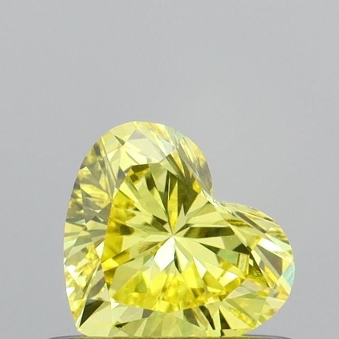 Loose Diamond - HEART 0.38ct Fancy Vivid Yellow VS1: Loose Diamond - HEART 0.38ct Fancy Vivid Yellow VS1 Source: This is a real non-mined Diamond that has been grown in a lab Shape: HEART Carats: 0.38 Color: Fancy Vivid Yellow Certification: IGI Video: