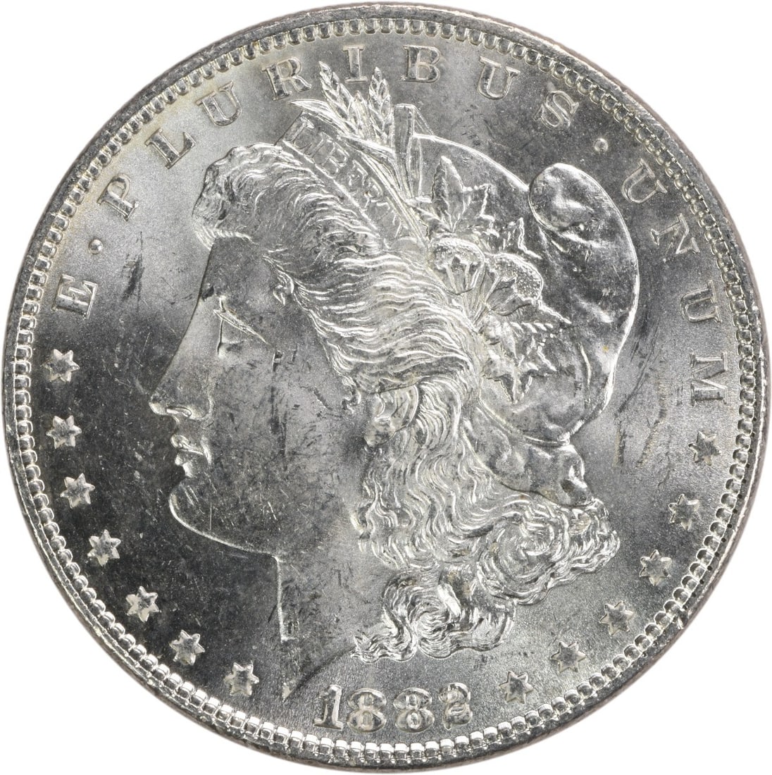Uncirculated 1882 Silver Dollar Morgan Choice BU No Mint Mark: Uncirculated 1882 Silver Dollar Morgan Choice BU No Mint Mark This is an 1882 Morgan Silver Dollar from the United States, featuring a Choice Brilliant Uncirculated (BU) grade. The coin is uncertified