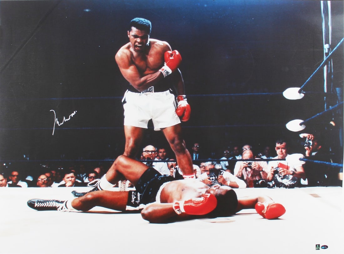 Muhammad Ali Signed 24x36 Vs Sonny Liston Canvas PSA/DNA Authenticated: Muhammad Ali Signed 24x36 Vs Sonny Liston Canvas PSA/DNA Authenticated Celebrate the legacy of boxing with this authentic signed 24x36 canvas featuring Muhammad Ali and Sonny Liston. Personally signed