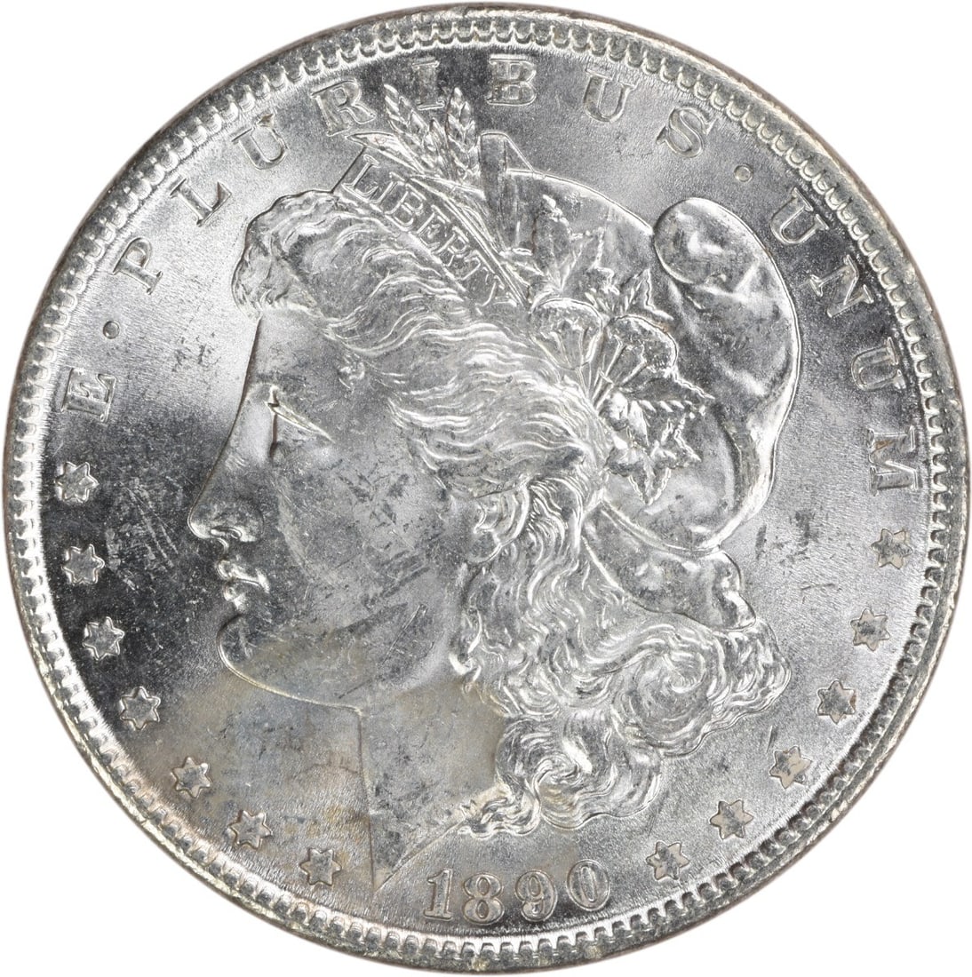 Uncirculated 1890 Morgan Silver Dollar Choice BU No Mint Mark: Uncirculated 1890 Morgan Silver Dollar Choice BU No Mint Mark This is an 1890 Morgan Silver Dollar from the United States, featuring a Choice Brilliant Uncirculated (BU) grade. The coin is composed of