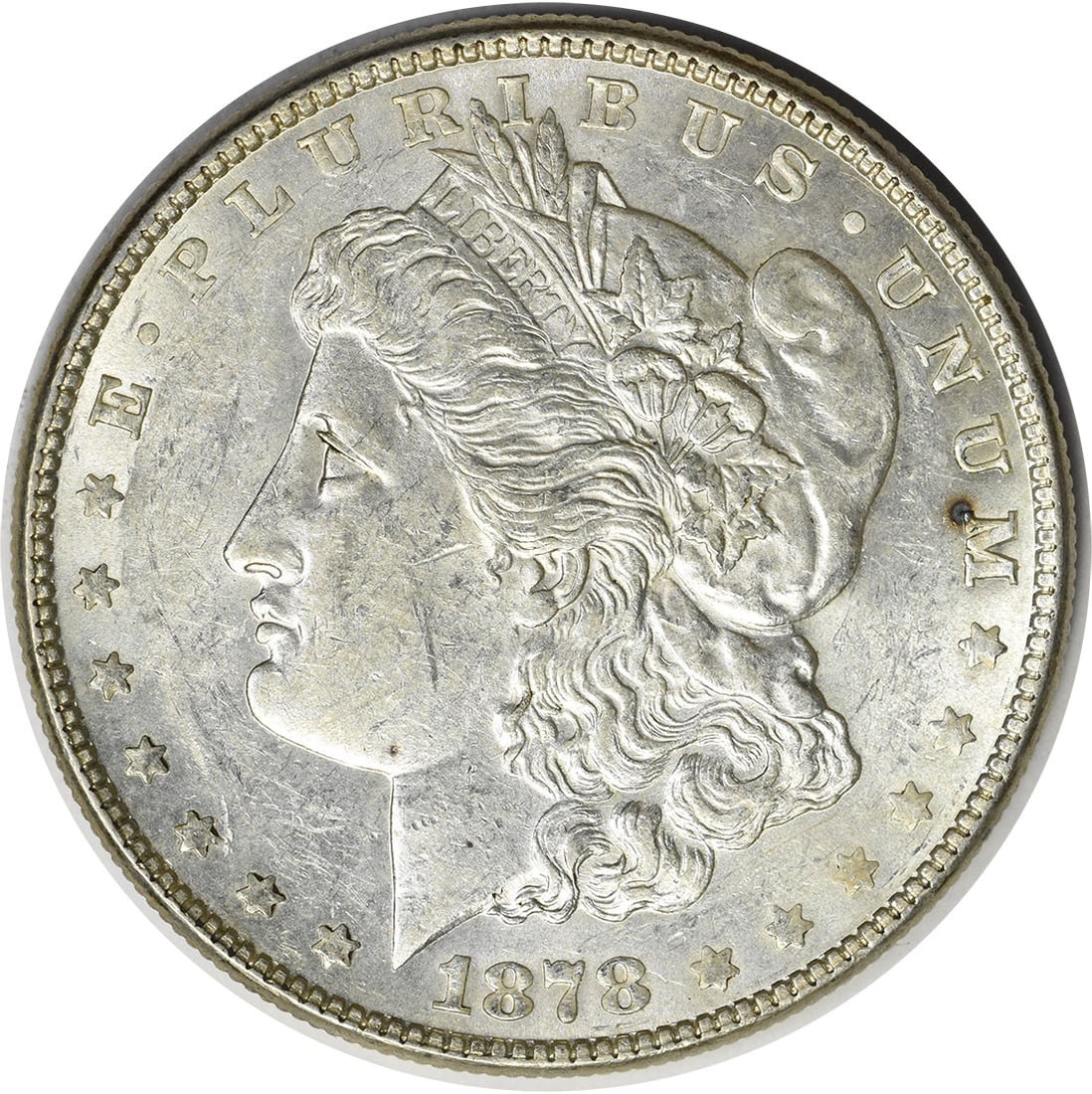 1878 7 Tail Feathers Morgan Dollar AU Philadelphia Uncertified Silver Coin: 1878 7 Tail Feathers Morgan Dollar AU Philadelphia Uncertified Silver Coin This 1878 Morgan Silver Dollar features the 7 Tail Feathers Reverse of 1878 design. Struck at the Philadelphia Mint and desig