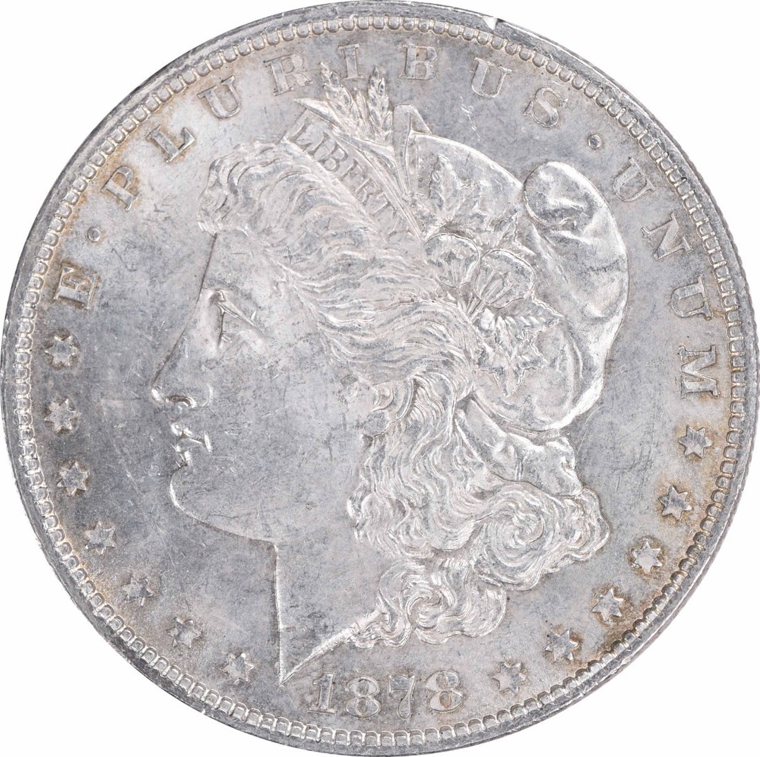 1878 Morgan Silver Dollar AU Uncertified 90% Silver Philadelphia Mint: 1878 Morgan Silver Dollar AU Uncertified 90% Silver Philadelphia Mint This 1878 Morgan Silver Dollar showcases a classic design by George T. Morgan, featuring a striking representation of Lady Liberty