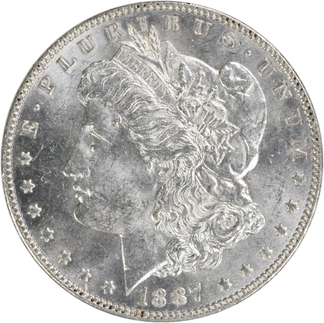 Brilliant Uncirculated 1887 Silver Morgan Dollar Philadelphia No Mint Mark: Brilliant Uncirculated 1887 Silver Morgan Dollar Philadelphia No Mint Mark This 1887 Morgan Silver Dollar is an uncirculated, brilliant uncirculated (BU) example. Struck in silver with no mint mark, i