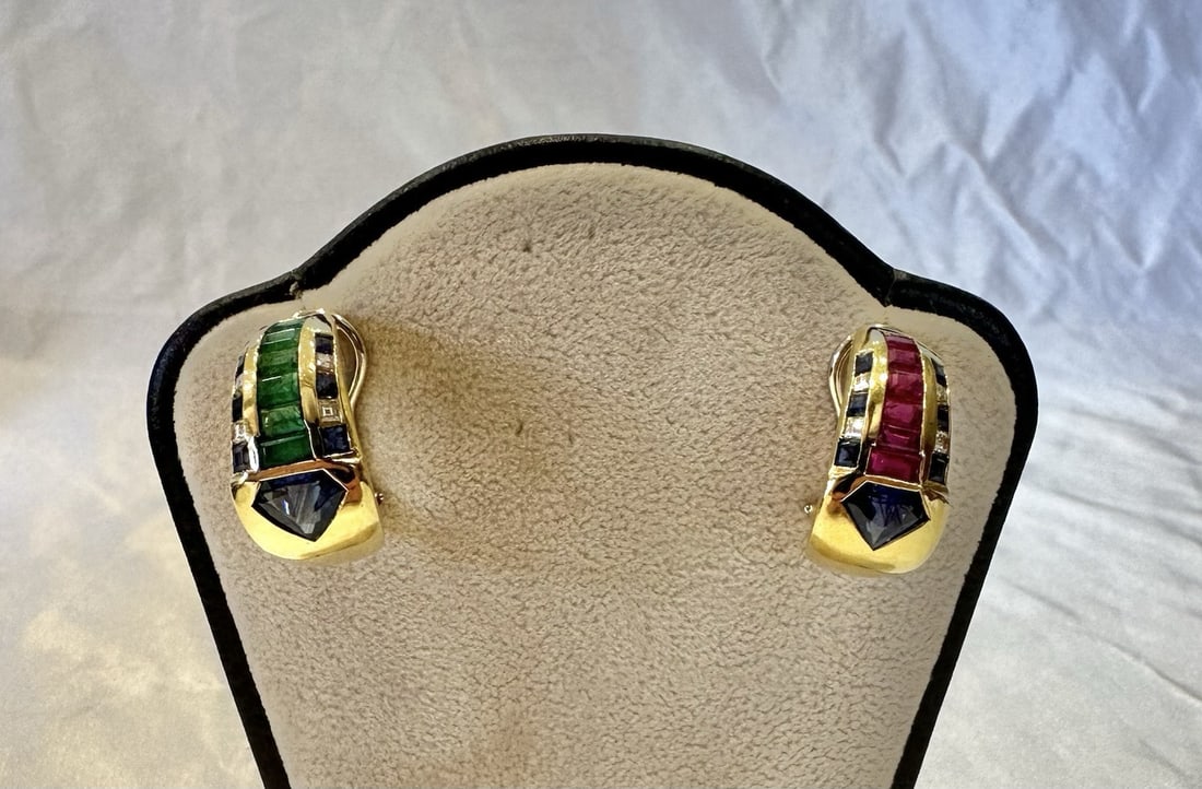 French 18K Gold Gemstone Earrings with Sapphire Ruby Emerald Diamonds: French 18K Gold Gemstone Earrings with Sapphire Ruby Emerald Diamonds Introducing a stunning pair of French earrings, expertly crafted from 18K yellow gold and adorned with a breathtaking array of gem