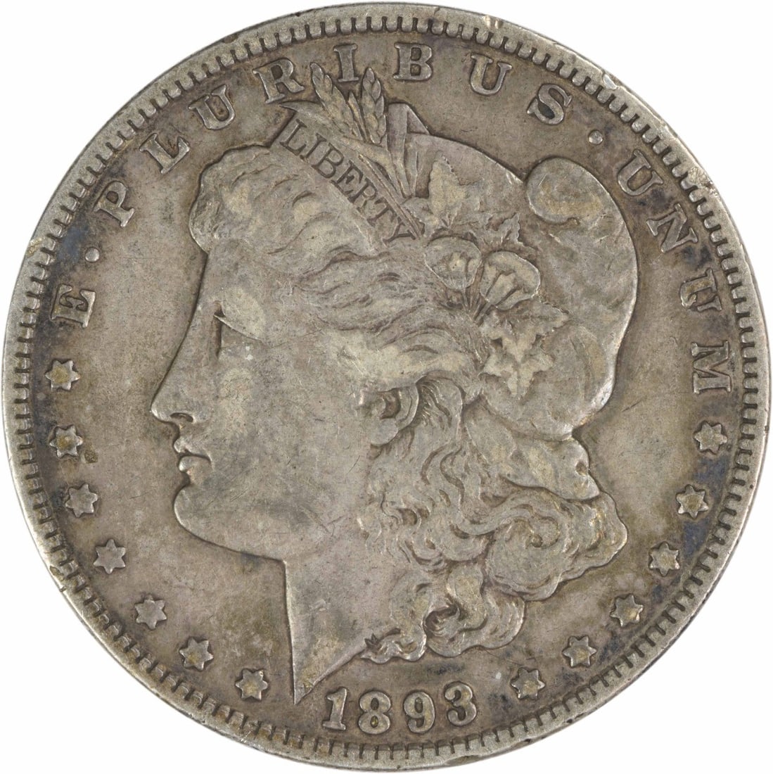 1893 Morgan Silver Dollar VF Uncertified 90% Silver Coin: 1893 Morgan Silver Dollar VF Uncertified 90% Silver Coin This 1893 Morgan Silver Dollar is a beautifully circulated coin that showcases the iconic design by George T. Morgan. With a composition of 90%