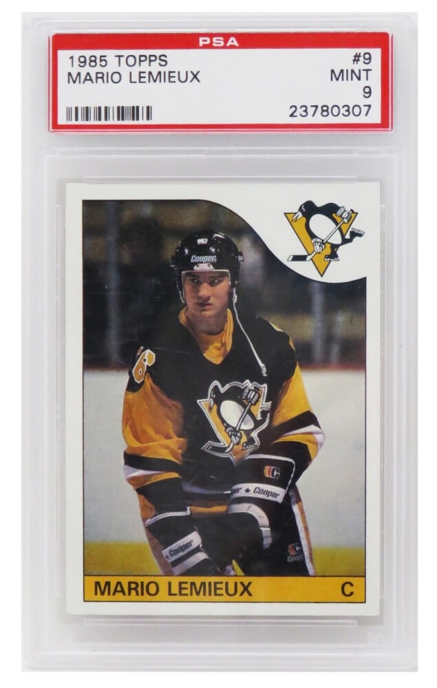 Mario Lemieux 1985 Topps Hockey Rookie Card #9 PSA 9 Mint: Mario Lemieux 1985 Topps Hockey Rookie Card #9 PSA 9 Mint This listing features a Mario Lemieux rookie trading card from the 1985 Topps Hockey set, card number 9. Encapsulated and graded Mint 9 by Pro