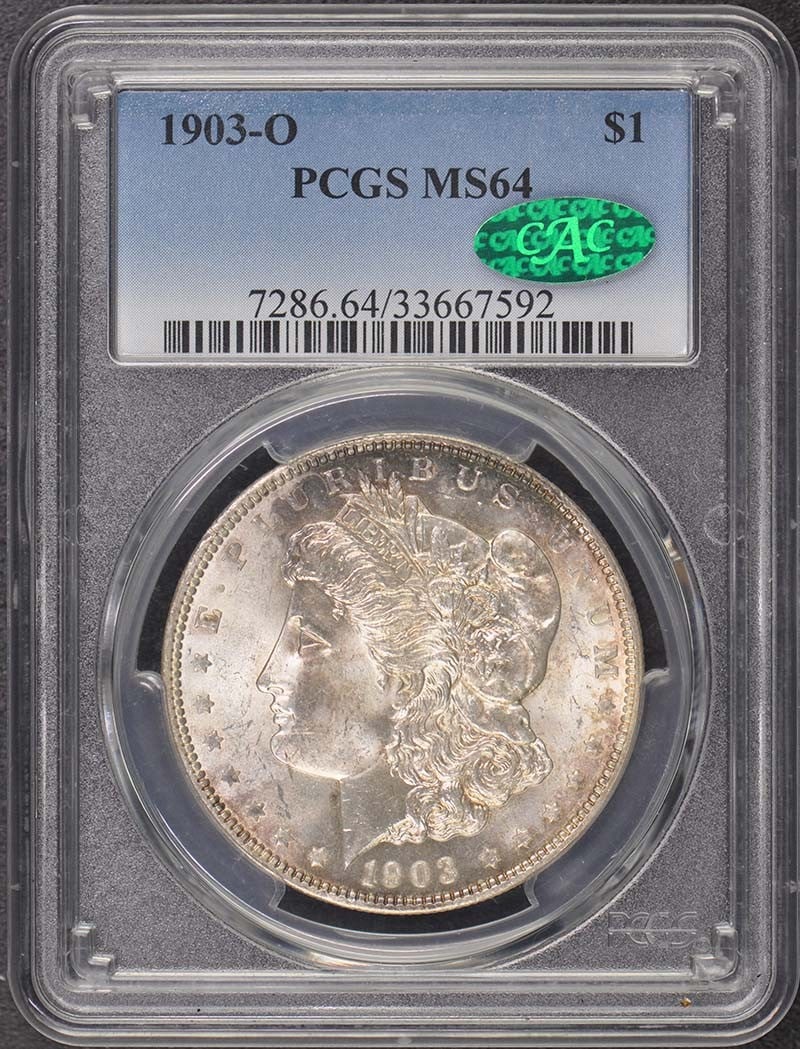1903-O Morgan Dollar PCGS MS64 CAC Certified Uncirculated: 1903-O Morgan Dollar PCGS MS64 CAC Certified Uncirculated This 1903-O Morgan Dollar is a stunning example of American numismatic history, certified by PCGS with a grade of MS64, indicating it is uncir