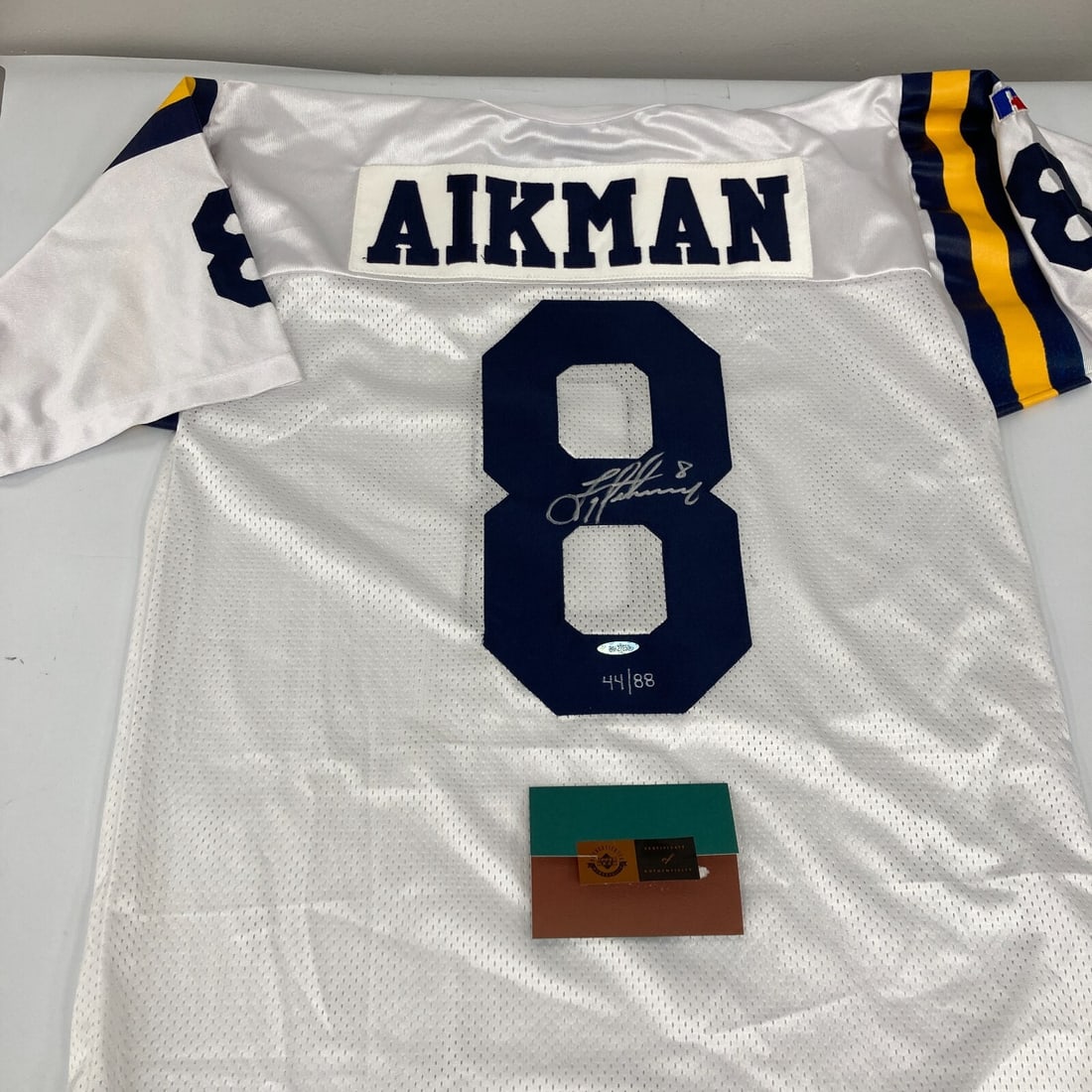Troy Aikman Signed UCLA Bruins Jersey Limited Edition 44/88 UDA COA: Troy Aikman Signed UCLA Bruins Jersey Limited Edition 44/88 UDA COA This is an authentic UCLA Bruins game model jersey signed by Pro Football Hall of Famer Troy Aikman. The jersey is a Russell Athleti