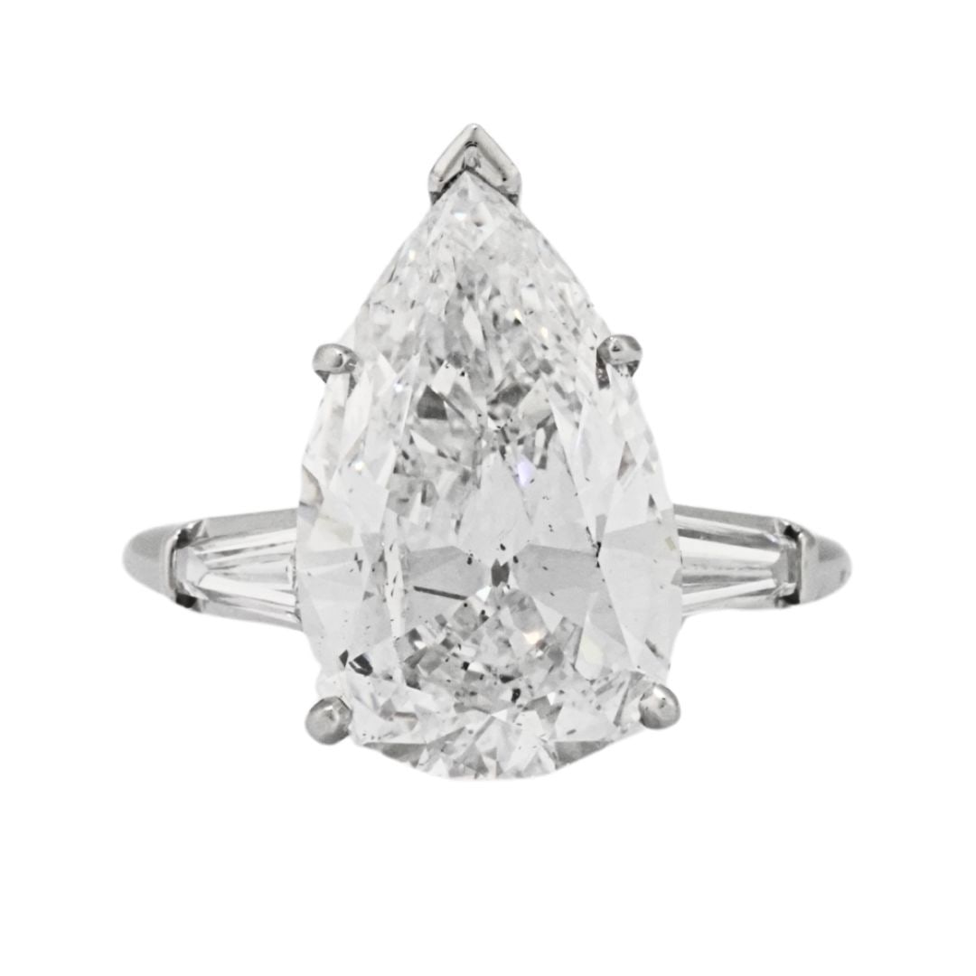 GIA Certified Platinum Pear Diamond Solitaire Ring 6.73ct SI2 D: GIA Certified Platinum Pear Diamond Solitaire Ring 6.73ct SI2 D This pre-owned platinum solitaire ring features a natural pear-shaped diamond as the main stone, graded D color and SI2 clarity. The rin