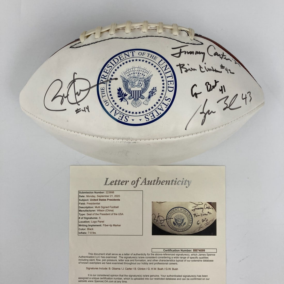 Signed Presidential Football by Obama Clinton Bush Carter JSA Authenticated: Signed Presidential Football by Obama Clinton Bush Carter JSA Authenticated This remarkable Wilson football features the signatures of five former U.S. Presidents: Barack Obama, Jimmy Carter, Bill Cli