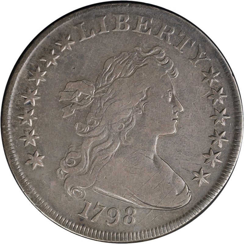 1798 Silver Draped Bust Dollar VF Details Nice Strike: 1798 Silver Draped Bust Dollar VF Details Nice Strike This 1798 Draped Bust Dollar is a circulated silver coin from the United States, featuring a nice strike and decent eye appeal. The coin is graded