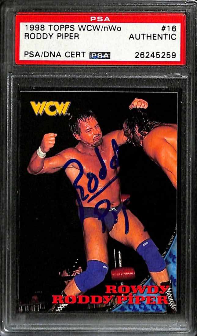 Rowdy Roddy Piper 1998 Topps WCW/nWo #16 Signed Card PSA/DNA Beckett: Rowdy Roddy Piper 1998 Topps WCW/nWo #16 Signed Card PSA/DNA Beckett This is an autographed 1998 Topps WCW/nWo #16 sports trading card featuring the legendary professional wrestler "Rowdy Roddy Piper"