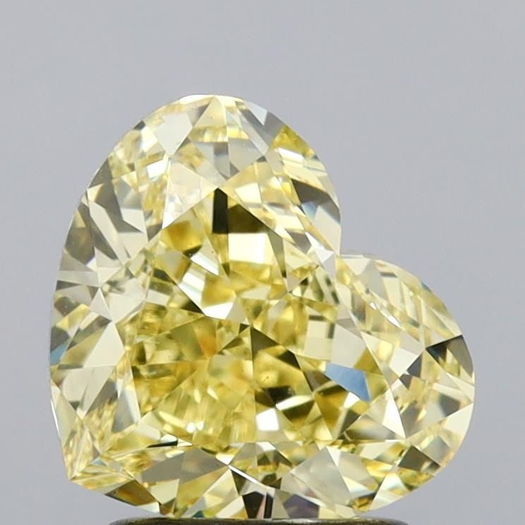 Loose Diamond - HEART 2.19ct Fancy Yellow VS1: Loose Diamond - HEART 2.19ct Fancy Yellow VS1 Source: This is a real non-mined Diamond that has been grown in a lab Shape: HEART Carats: 2.19 Color: Fancy Yellow Certification: IGI Video: