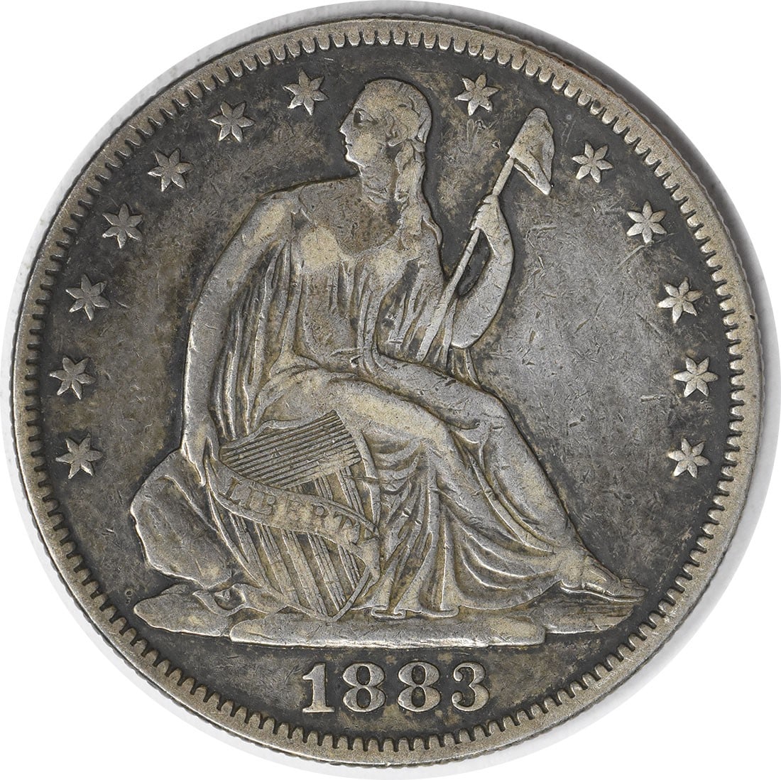 1883 Seated Liberty Half Dollar 90 Percent Silver Circulated XF Uncertified: 1883 Seated Liberty Half Dollar 90 Percent Silver Circulated XF Uncertified This 1883 Liberty Seated Silver Half Dollar from the United States features the iconic Seated Liberty design by Thomas Sully