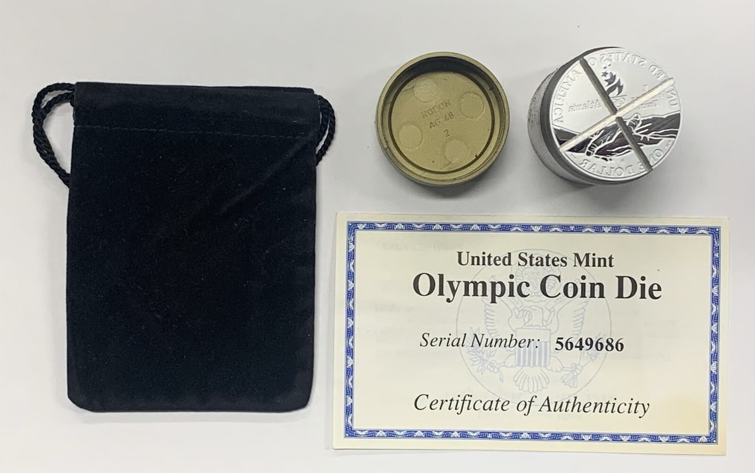 1995 Olympic Proof Silver Dollar Commemorative With Reverse Canceled Die and COA: 1995 Olympic Proof Silver Dollar Commemorative With Reverse Canceled Die and COA This set features a 1995 United States Olympic Silver $1 Dollar Coin with a reverse canceled die and includes a Certifi