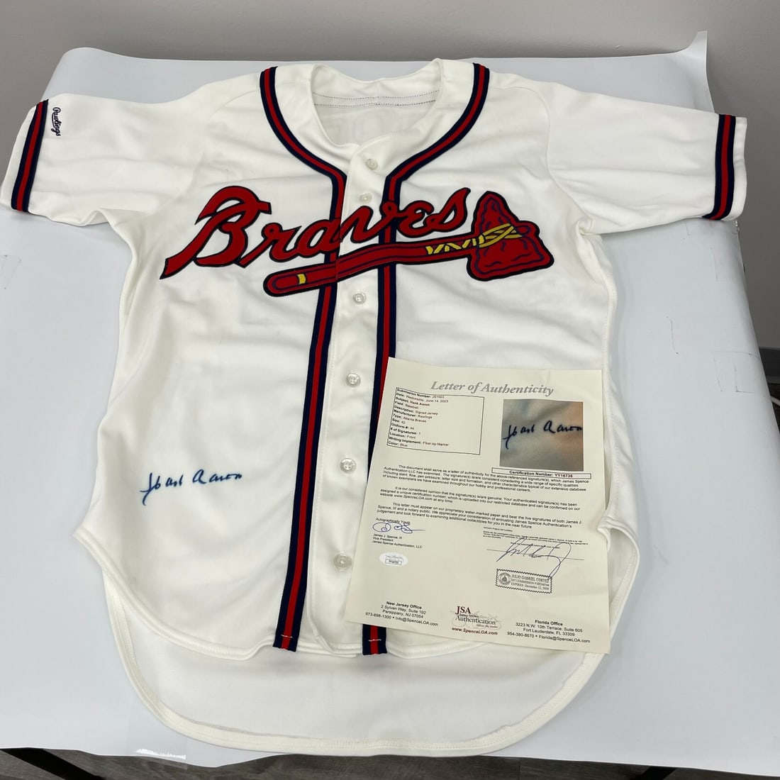 Hank Aaron Signed Atlanta Braves Game Jersey PSA Authenticated: Hank Aaron Signed Atlanta Braves Game Jersey PSA Authenticated Celebrate the legacy of baseball legend Hank Aaron with this authentic Atlanta Braves game model jersey, signed by Aaron himself. This or