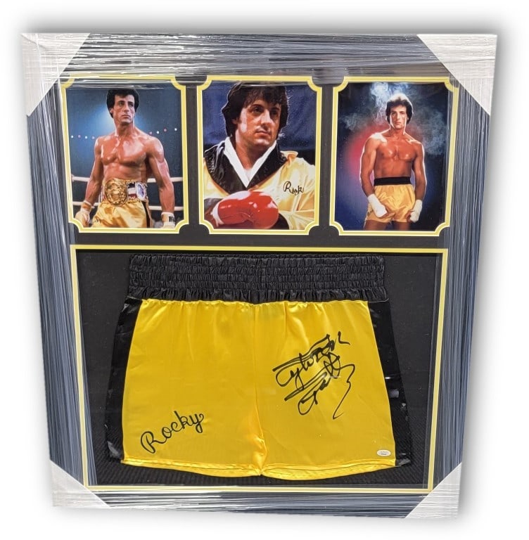 Sylvester Stallone Signed Boxing Trunks Framed with JSA Authentication: Sylvester Stallone Signed Boxing Trunks Framed with JSA Authentication This item features a pair of boxing trunks personally autographed by Sylvester Stallone, famously known for his role in the iconi
