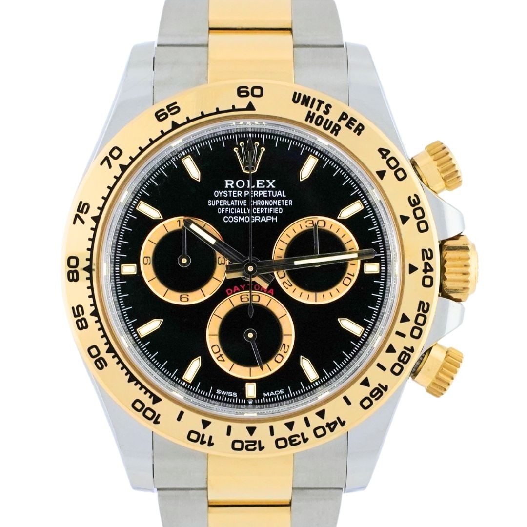 Rolex Cosmograph Daytona 40mm Black Dial Gold Steel Oyster Bracelet: Rolex Cosmograph Daytona 40mm Black Dial Gold Steel Oyster Bracelet This Rolex Cosmograph Daytona wristwatch features a 40mm polished stainless steel case with 18K yellow gold accents. The watch is eq