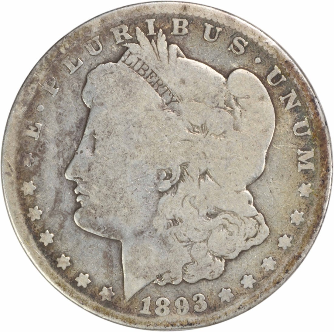 1893 Carson City Morgan Silver Dollar G Uncertified: 1893 Carson City Morgan Silver Dollar G Uncertified This 1893-CC Morgan Silver Dollar is an iconic piece of American numismatic history. It features a composition of 90% silver and 10% copper, showcas