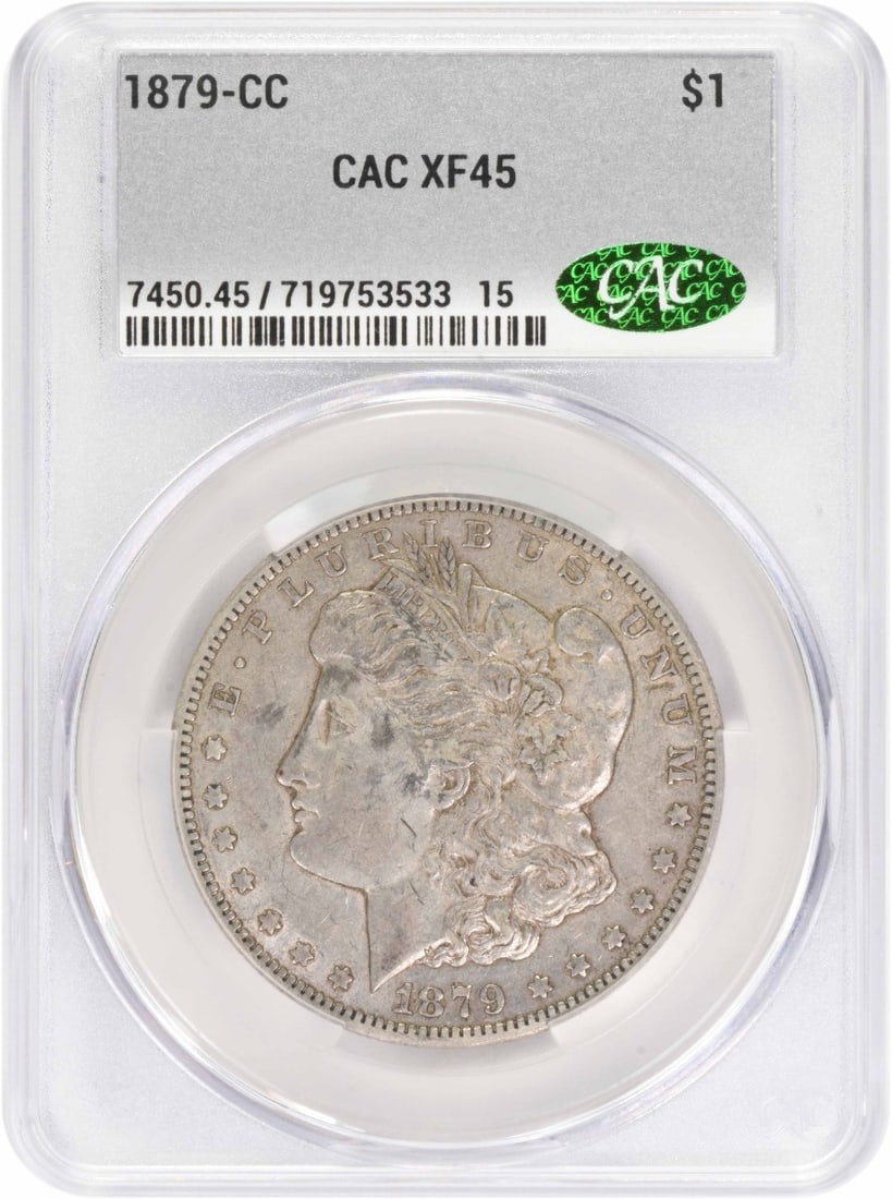 CACG Certified 1879 CC Morgan Dollar EF45: CACG Certified 1879 CC Morgan Dollar EF45 This is an 1879-CC Morgan Silver Dollar graded EF45 by CACG. The coin is composed of 90% silver and 10% copper, was minted in Carson City, and features the de
